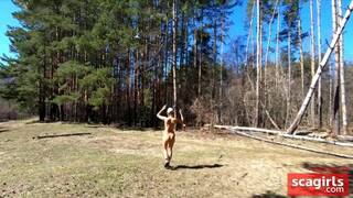 Naked Teen with Big Ass Walks in the Spring Forest