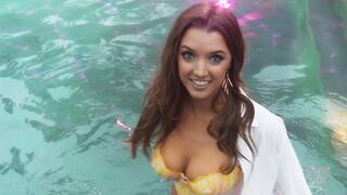 Beautiful big tits MILF reveals hot body so busty MILF posed in the pool